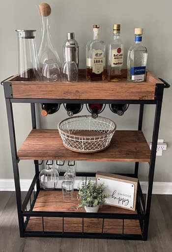 Reviewer image of brown and black bar cart