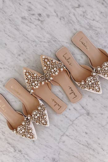 three pairs of pearl embellished flats