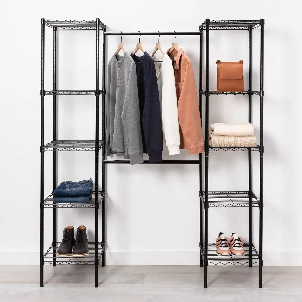 lifestyle photo of black wire closet system with clothes and bags