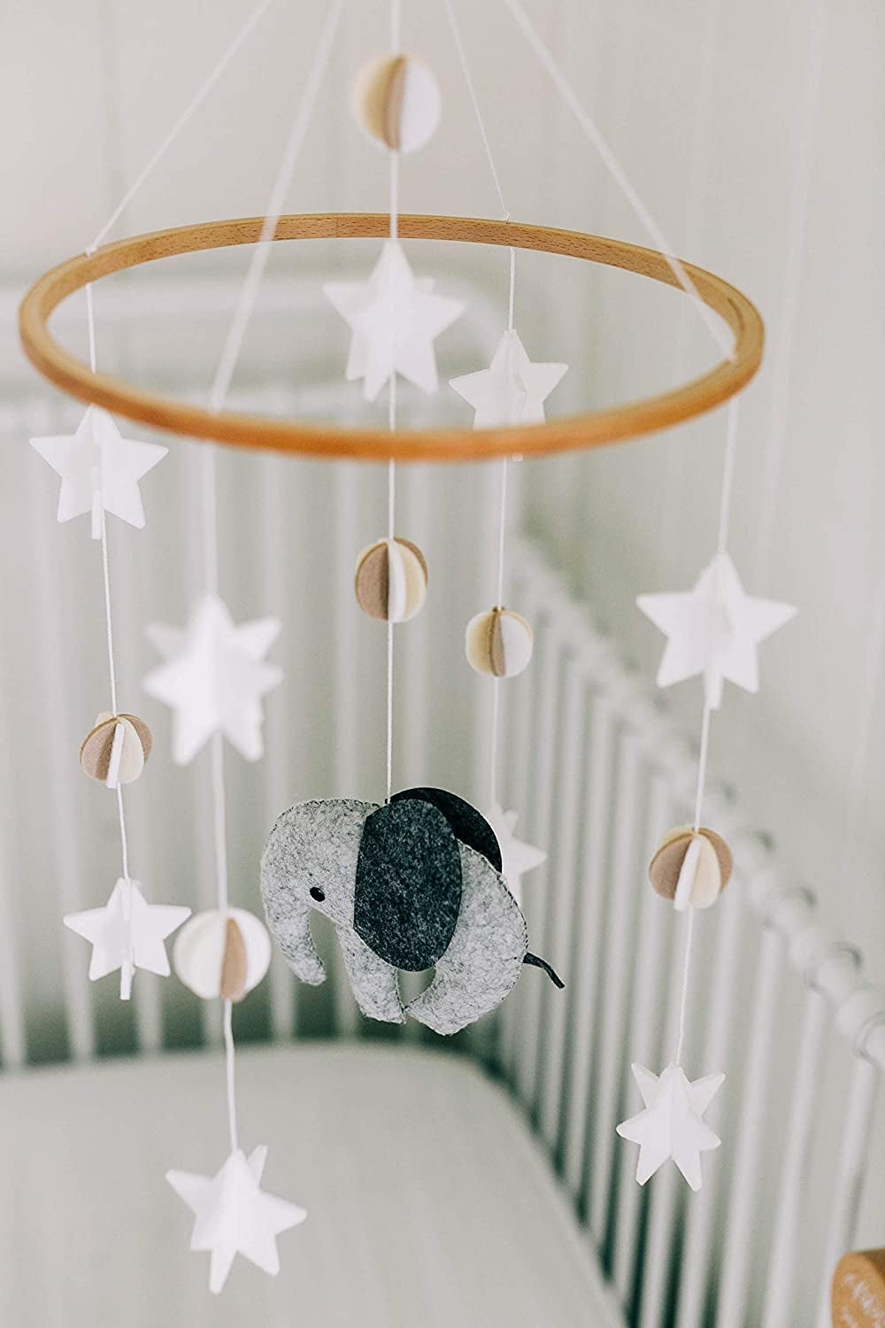 wood and felt mobile with elephant and stars