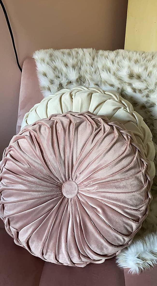 Reviewer image of the pink and white pillows