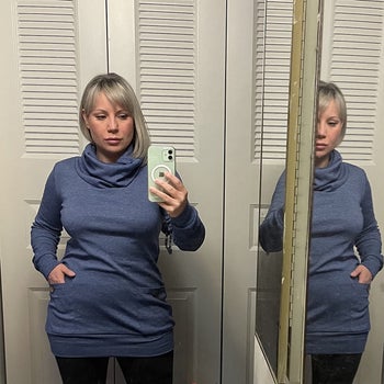 Reviewer wearing the top in blue