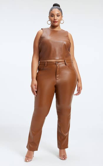 A model posing in the brown pants