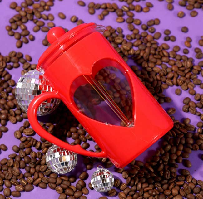 the gallic property laying connected a aboveground covered with java beans and disco balls
