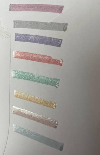 reviewer's light swatches of glittery highlighers
