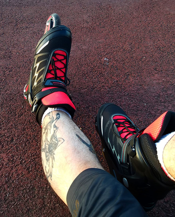Reviewer wearing the red and black Rollerblades
