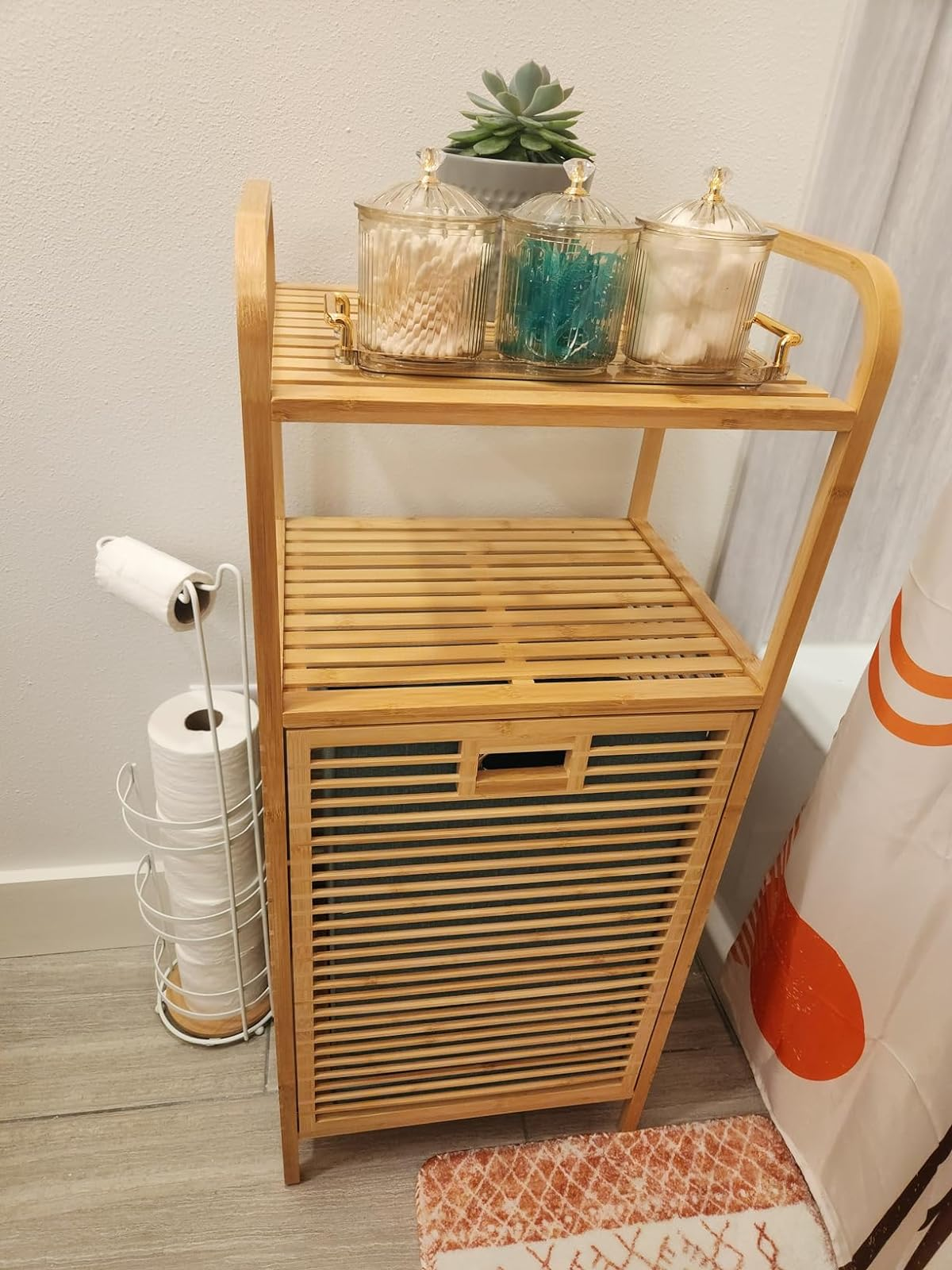 reviewer's bamboo retention  support  adjacent  to shower