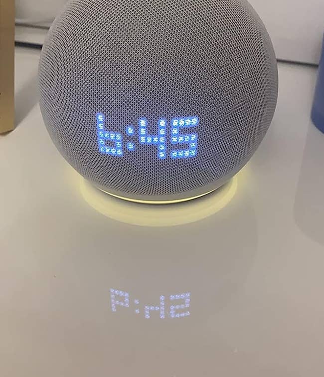 A close up view of the Echo Dot on the reviewer's desk