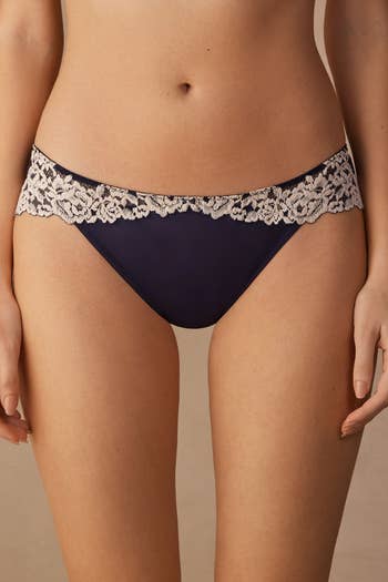 model showing thee front of the pantie with lace across the top