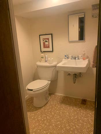 the before photo of an average-looking bathroom