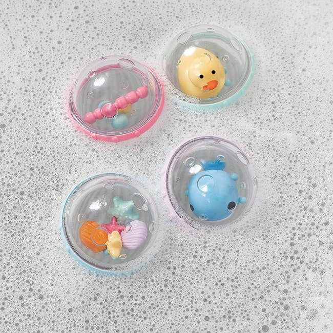 four floating bath bubble toys