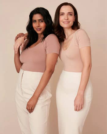 Two models wearing the tops in toffee and classic colors