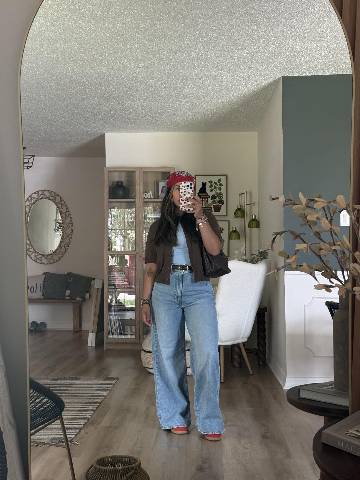 reviewer wearing the jeans with a casual outfit