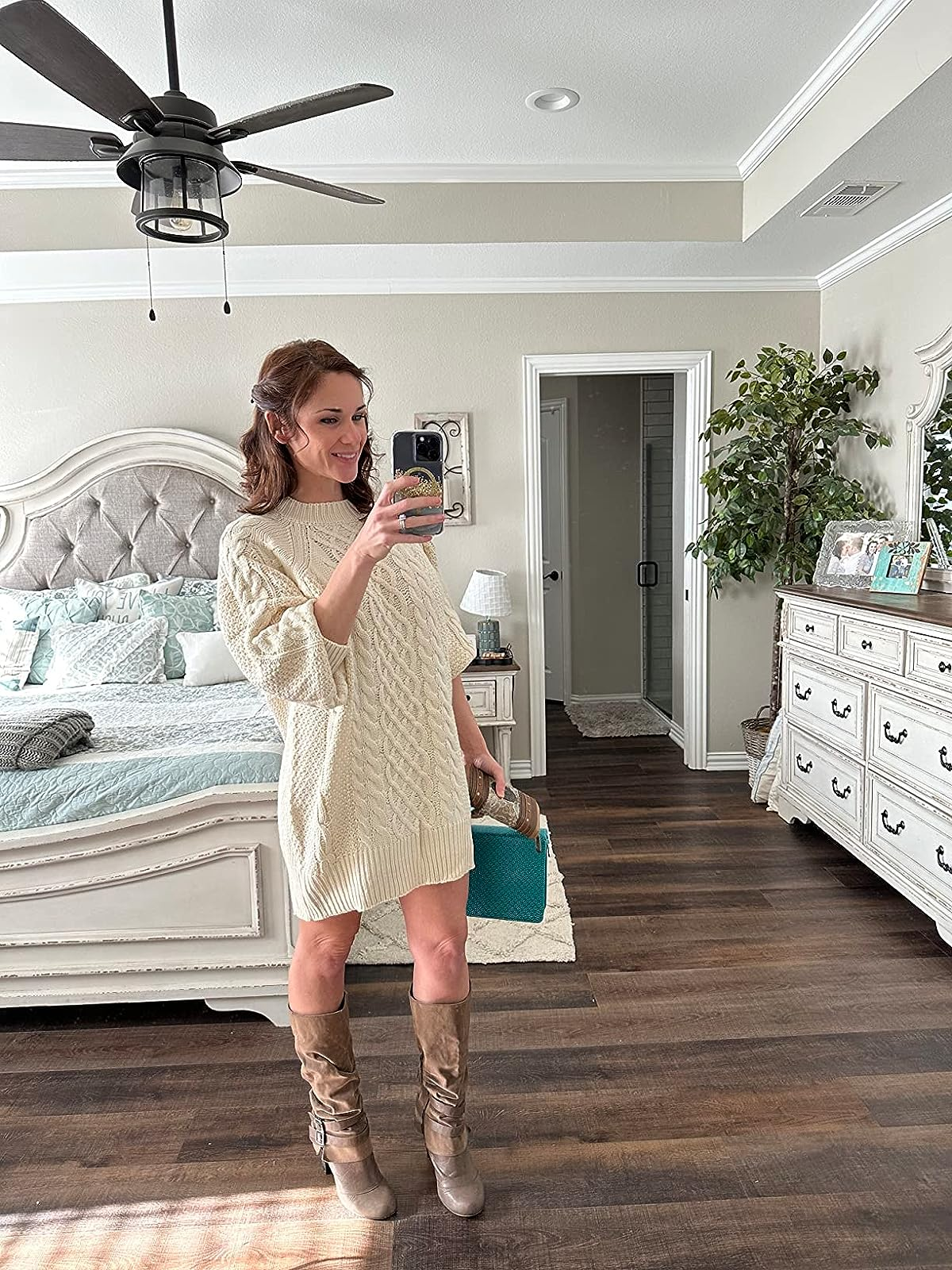 another reviewer wearing the sweater successful  cream