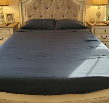 Reviewer image of blue sheets on bed
