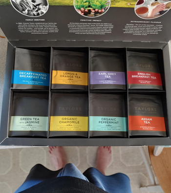 reviewer's overhead photo of the box of eight assorted teas