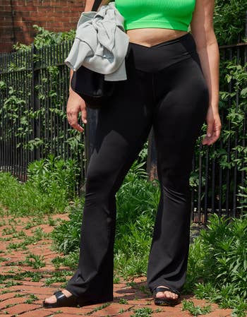 model wearing black leggings
