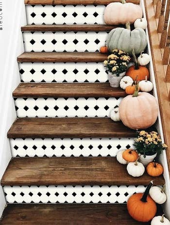 the black and white tile decals on stairs