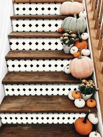 the black and white tile decals on stairs