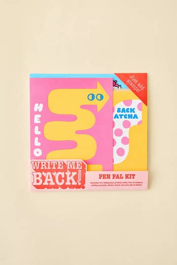 Pen pal kit packaging featuring bold, playful typography and colorful letters on a beige background