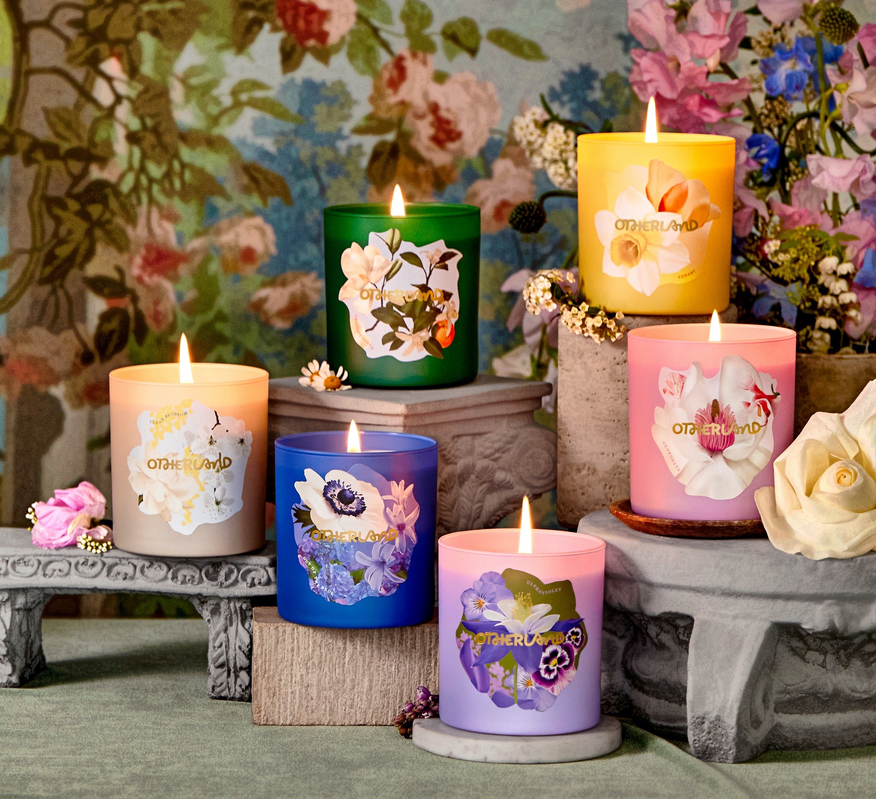 an array of floral-themed otherland candles