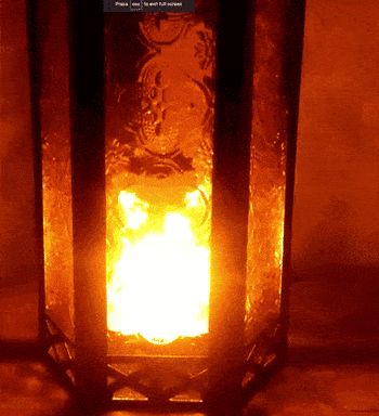 gif of the lantern glowing at night with a candle lit inside