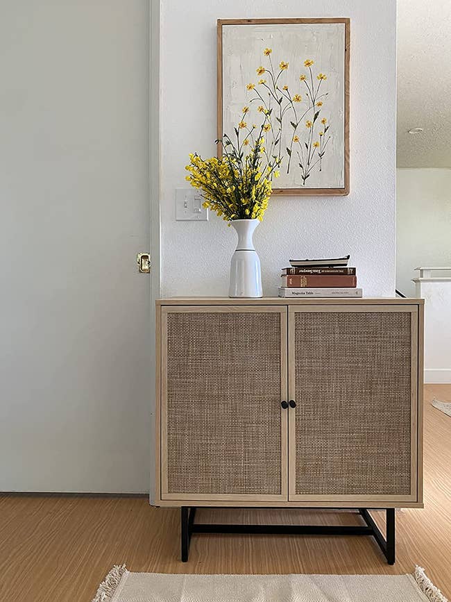 reviewer representation of the airy oak rattan accent retention cabinet