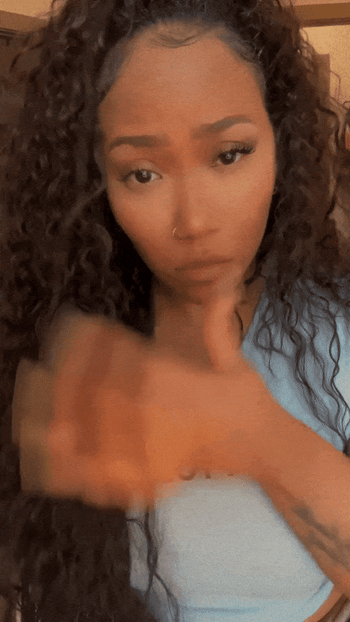 gif of me wearing wavy synthetic wig