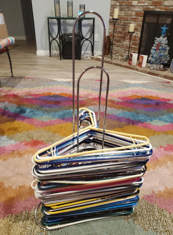 Reviewer's neatly stacked hangers after they used the hanger stacker