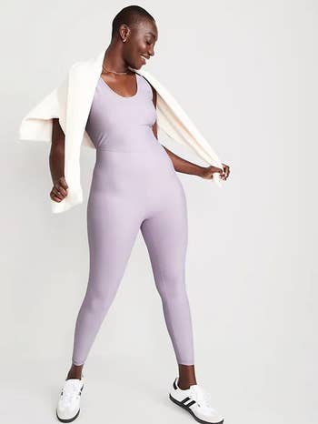 model wearing the scoop-neck full length bodysuit in lilac