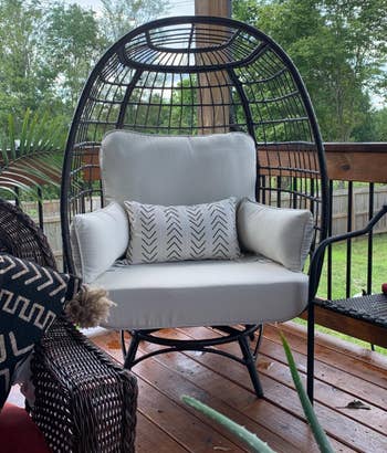 Reviewer image of the black chair on a deck
