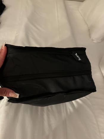 reviewer image of packing cube with clothes in it