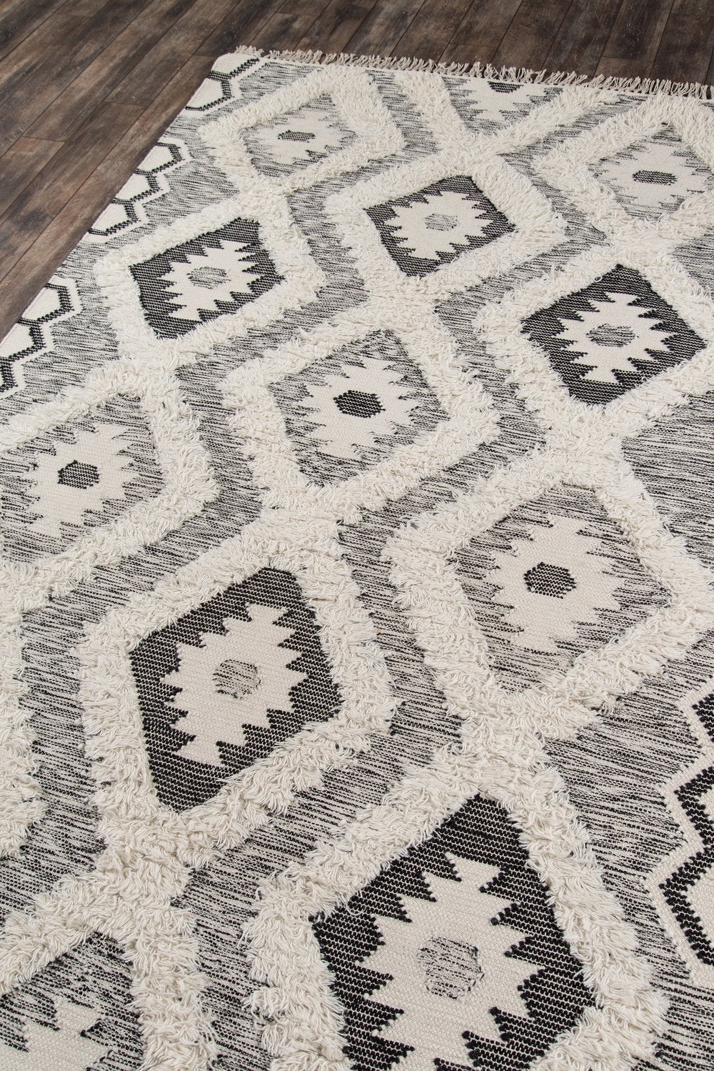 Southwestern-inspired rug with gray and black diamonds