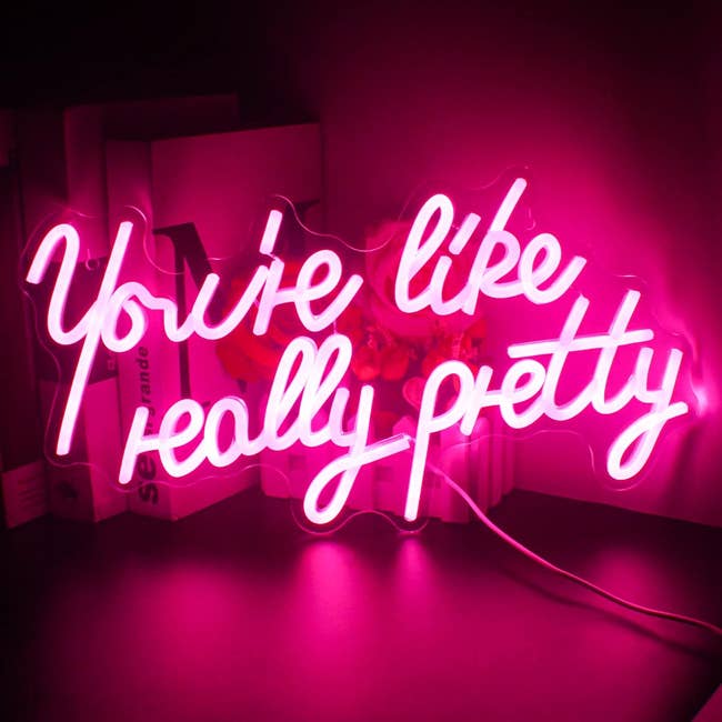 pink neon sign that says 