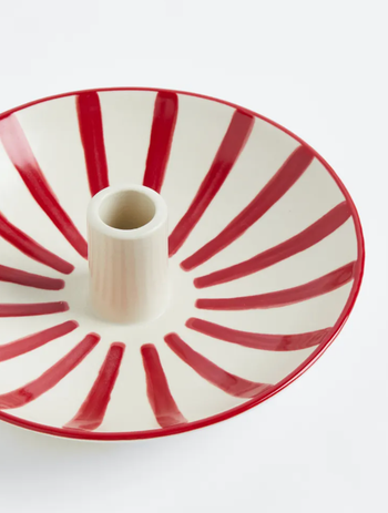 red and white-striped candle holder