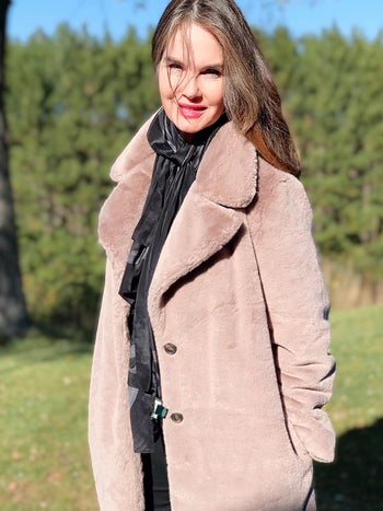 reviewer photo wearing the coat in beige