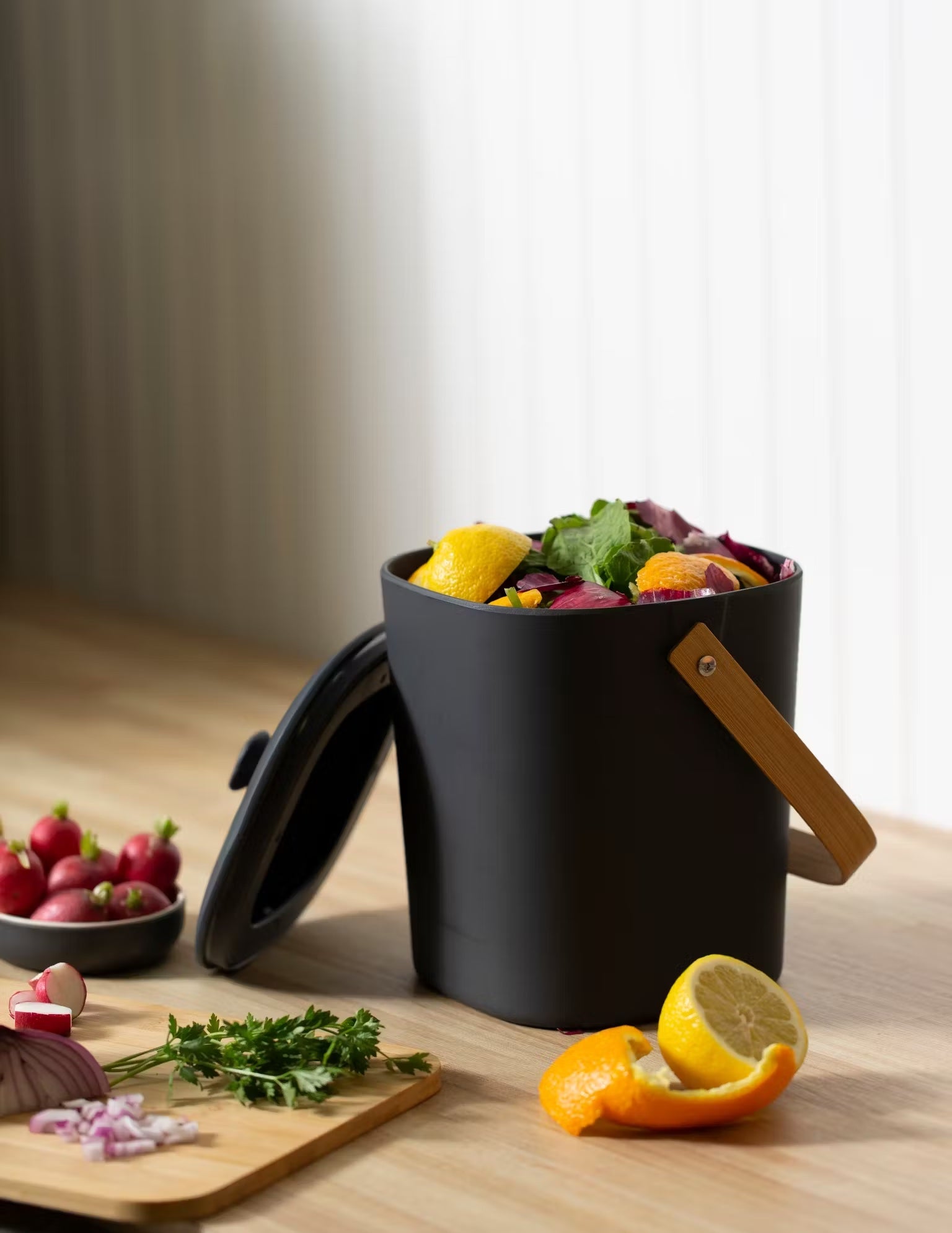 small pail with food scraps in it