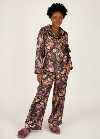 model wearing matching floral pajama set
