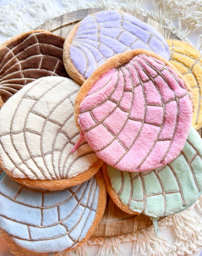 assorted concha bags successful  antithetic  colors