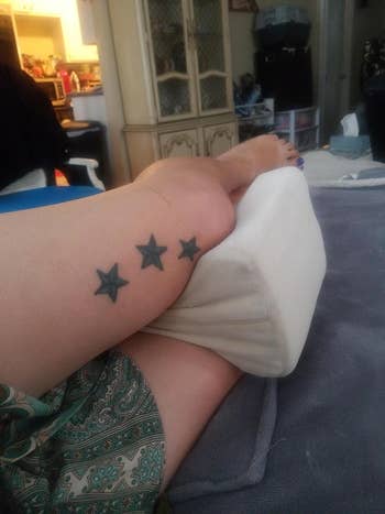 image of the pillow successful  betwixt  a reviewer's legs