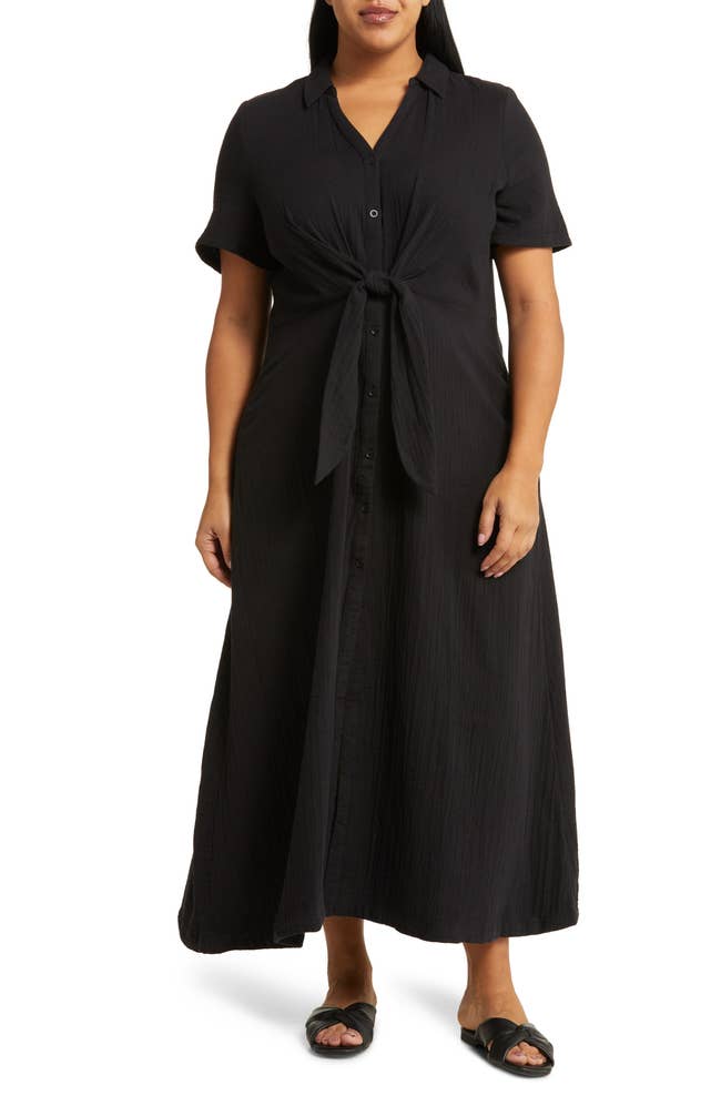 black gauze midi tress with buttons down the front and a tie waist