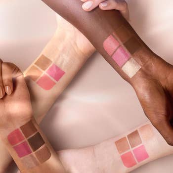 Several hands showcasing swatches of constitution  shades connected  their arms, highlighting a assortment  of tones for examination  and selection