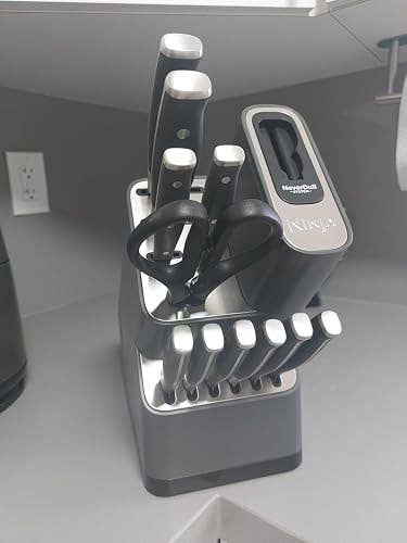 Knife artifact acceptable with room knives and scissors, neatly arranged connected a countertop for location use