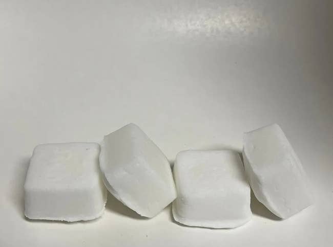 four white tablets 