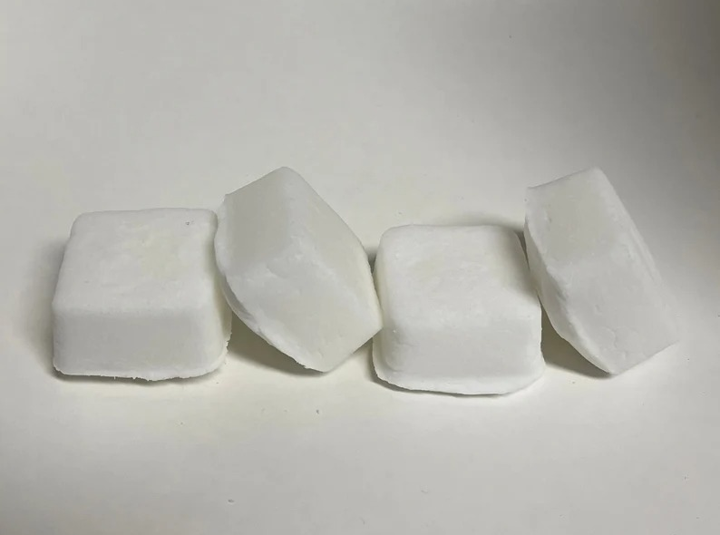 four white tablets 