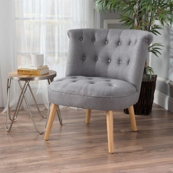 gray round tufted chair