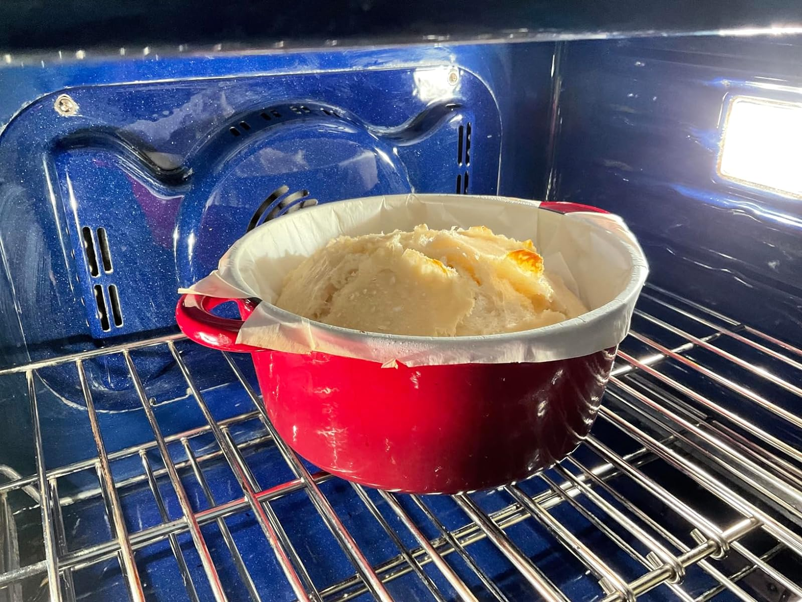 the reddish  dutch oven successful  the oven baking bread