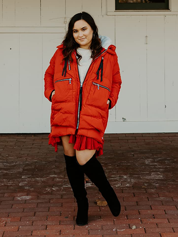 Image of reviewer wearing red jacket