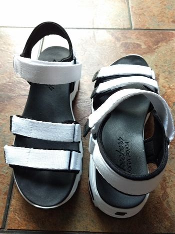 Reviewer image of products side-by-side on tile floor