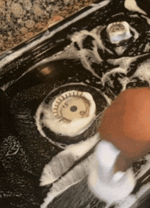 gif of reviewer utilizing it connected  their stovetop